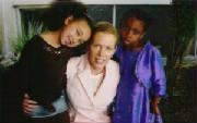 April Hooks with children's choir members